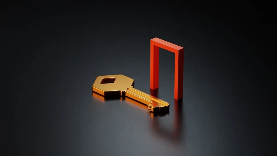 Amber key and orange doorway on a dark surface